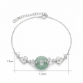 wholesale 925 Sterling Silver Elegant S925 Sterling Silver Bracelet with Green Jade Ring and White Floral Charms - JewelryODM-0-2